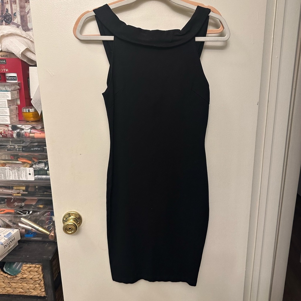 Form fitting black dress. Worn once. Size small